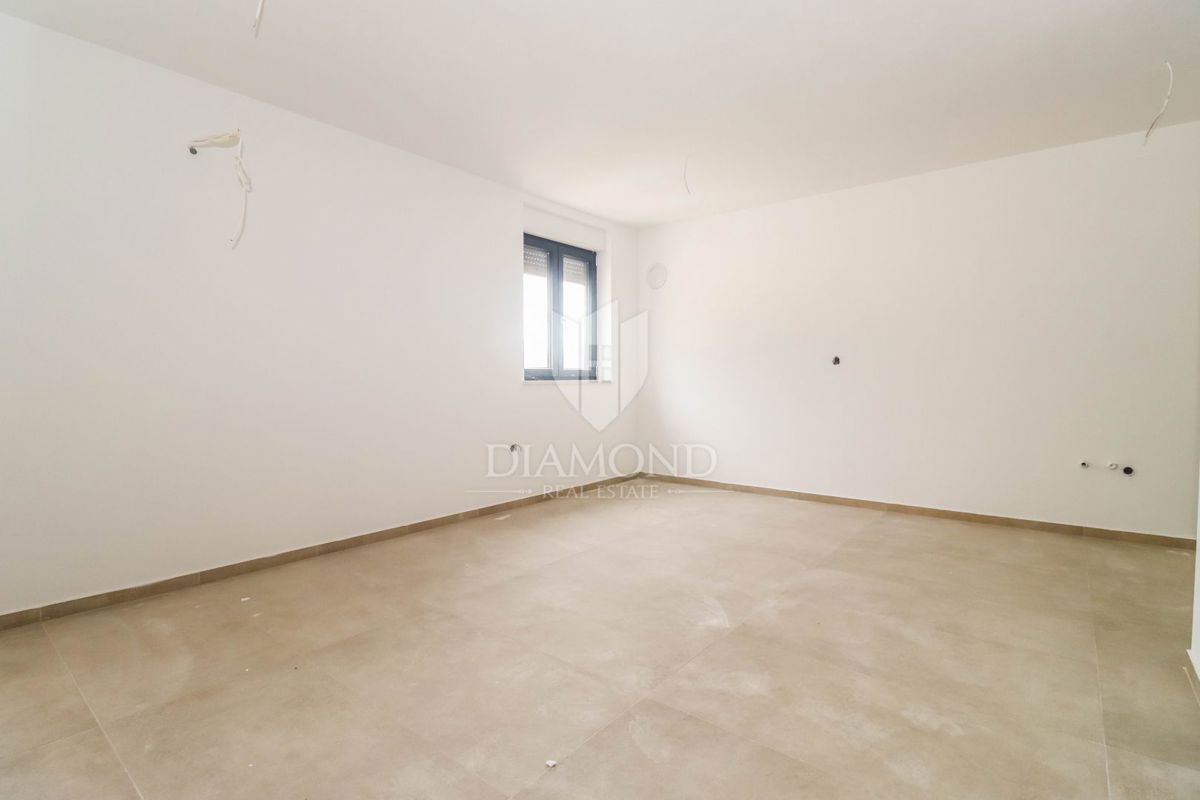 Novogradnja v zelenju, 55 m² stanovanje blizu morja in mestnega središča