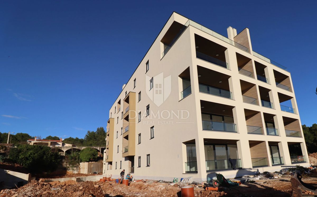 Novogradnja v zelenju, 55 m² stanovanje blizu morja in mestnega središča