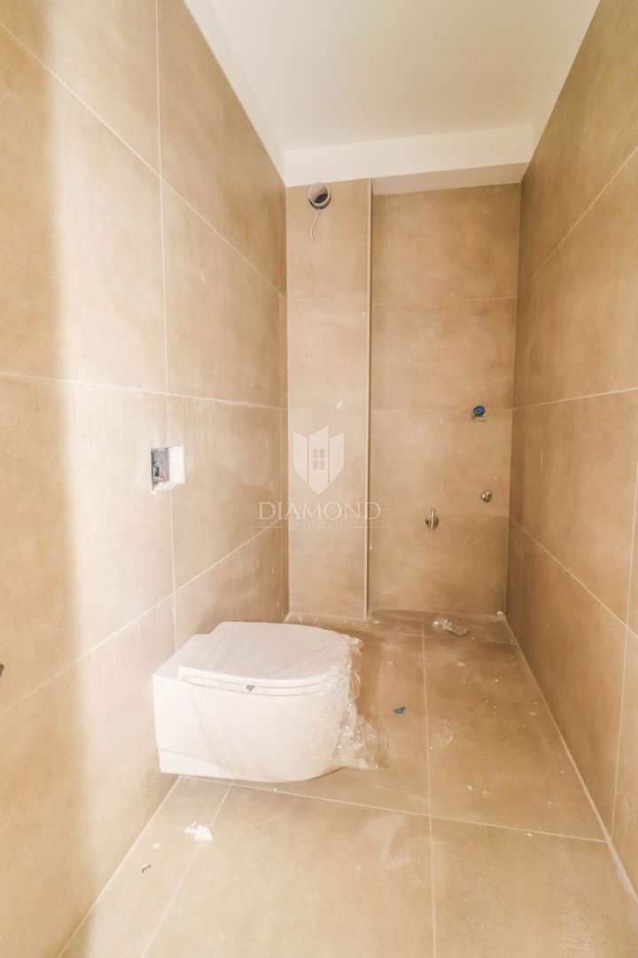 Novogradnja v zelenju, 55 m² stanovanje blizu morja in mestnega središča