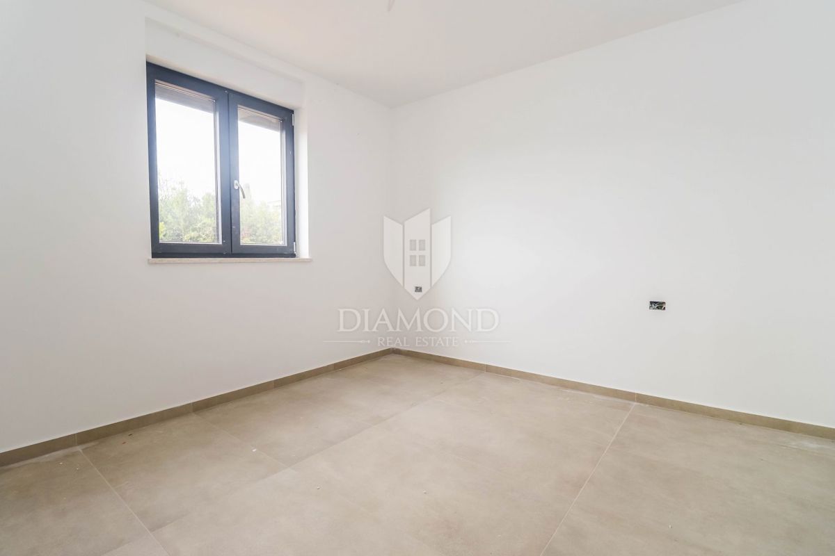 Novogradnja v zelenju, 55 m² stanovanje blizu morja in mestnega središča