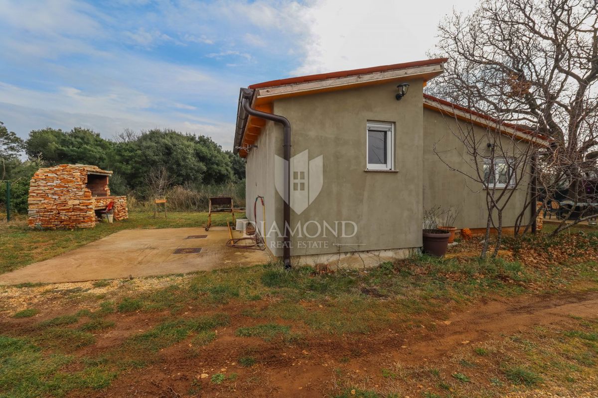 Nova vikend hiška 42 m², 450 m² parcela – mir, narava in morje na doseguikend hiška 42 m², 450 m² parcela – mir, narava in morje na dosegu