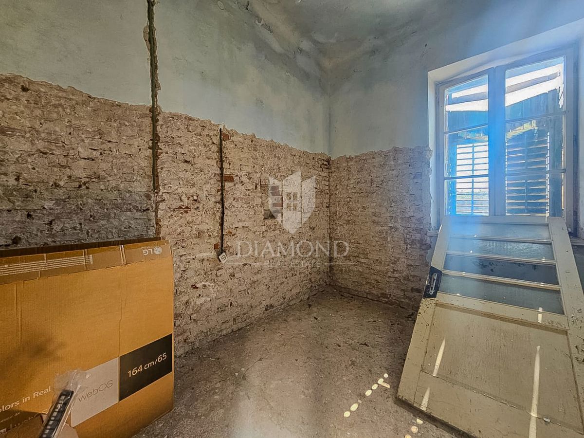 Buje, kamnita hiša s 4 apartmaji za investicijo!