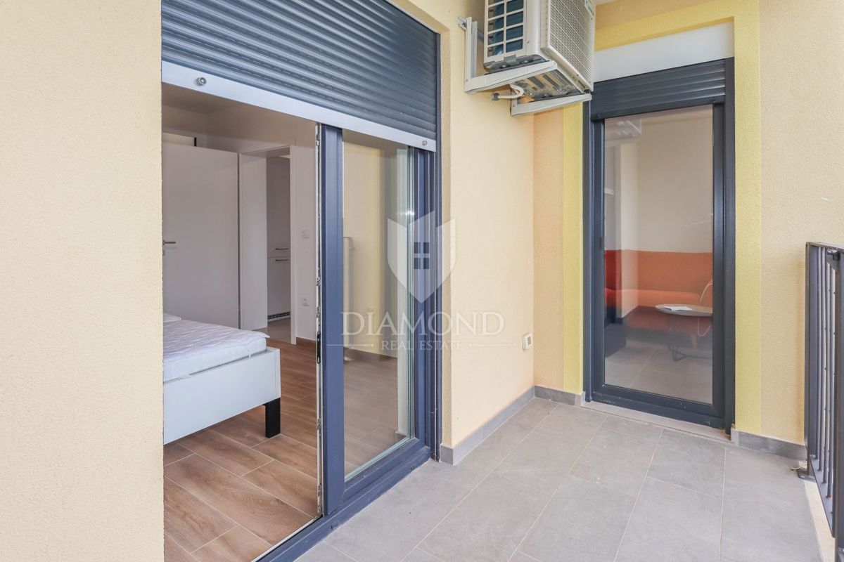 Stanovanje z vrtom in garažo na mirni lokaciji