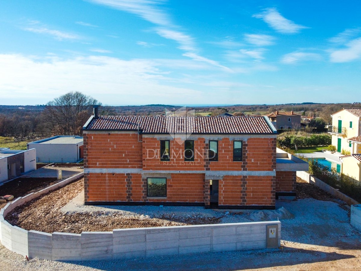 Poreč, okolica. Dizajnerska vila z wellnessom in pogledom na morje