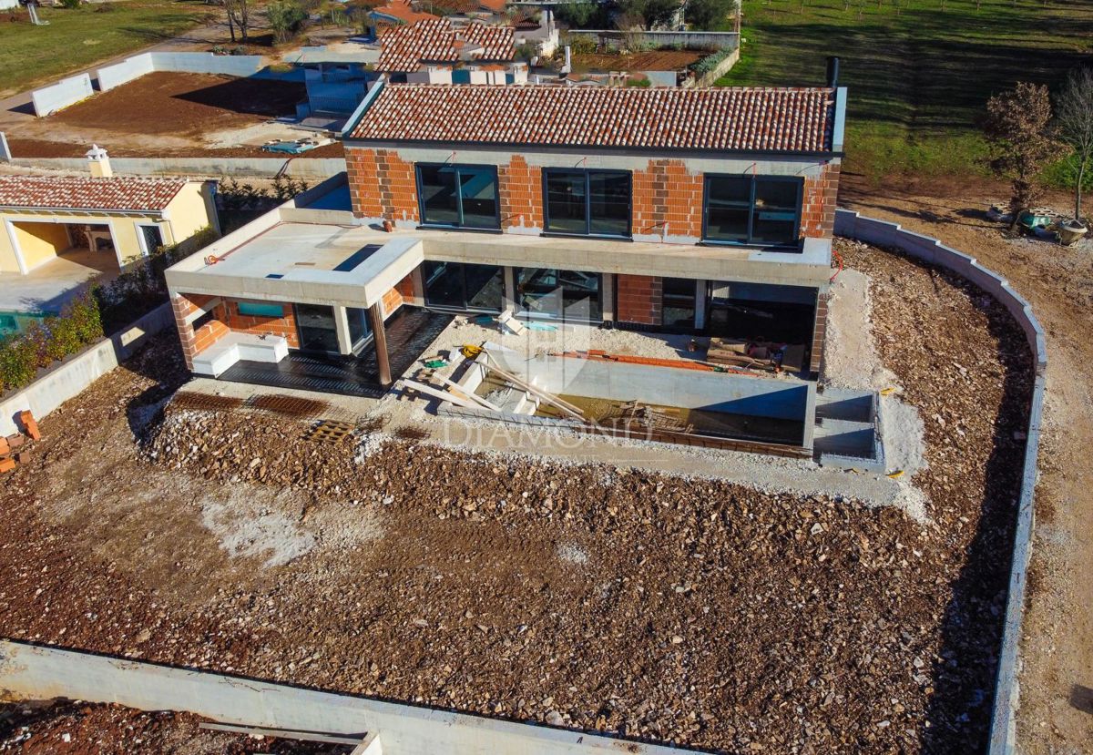 Poreč, okolica. Dizajnerska vila z wellnessom in pogledom na morje