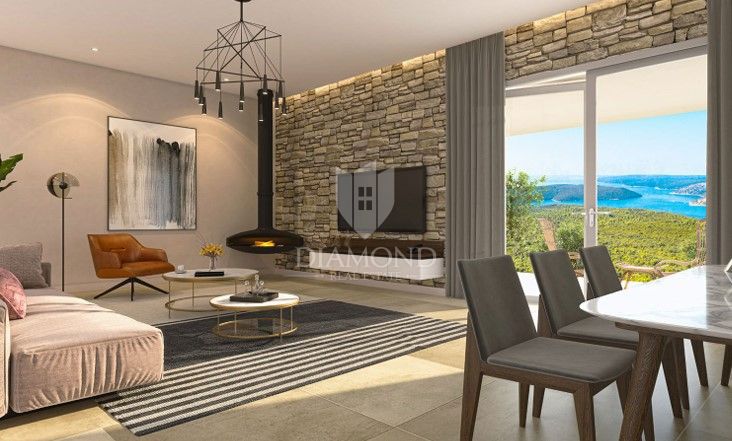 Labin, okolica, zemljišče z gradbenim dovoljenjem in pogledom na morje 