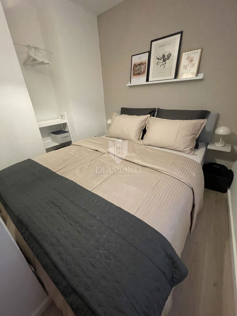 Dvoetažno stanovanje v središču mesta, tri spalnice, terasa, shramba