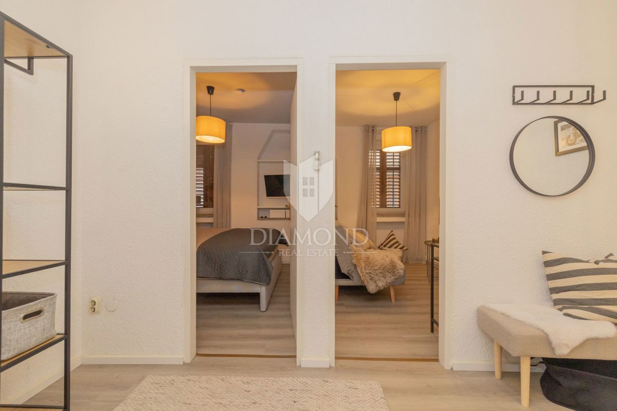 Dvoetažno stanovanje v središču mesta, tri spalnice, terasa, shramba