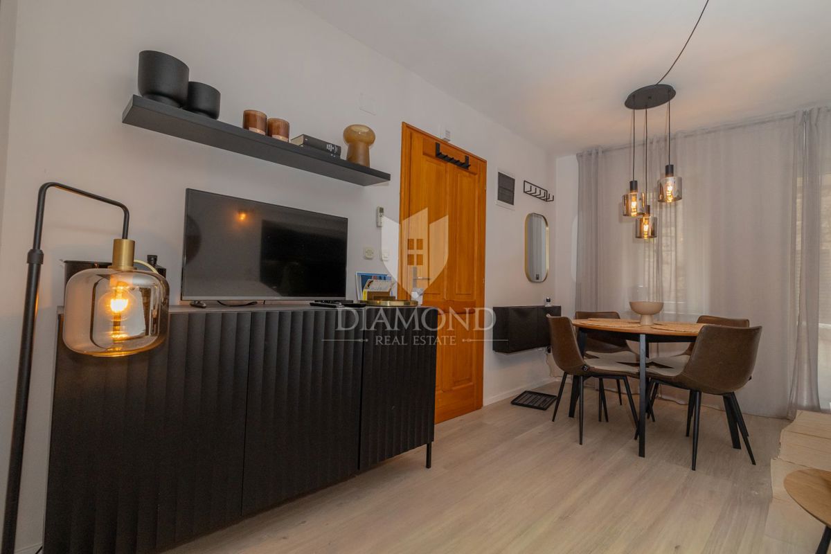 Dvoetažno stanovanje v središču mesta, tri spalnice, terasa, shramba