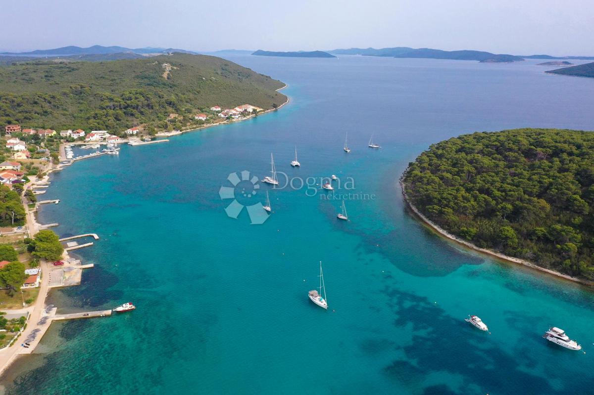 SREDOZEMSKI BISER NA OTOKU MOLATU - DVOJNA HIŠA Z VELIKIM TURISTIČNIM POTENCIALOM