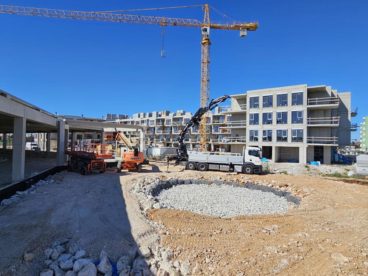 Umag, novogradnja, stanovanje z razgledom in garažo