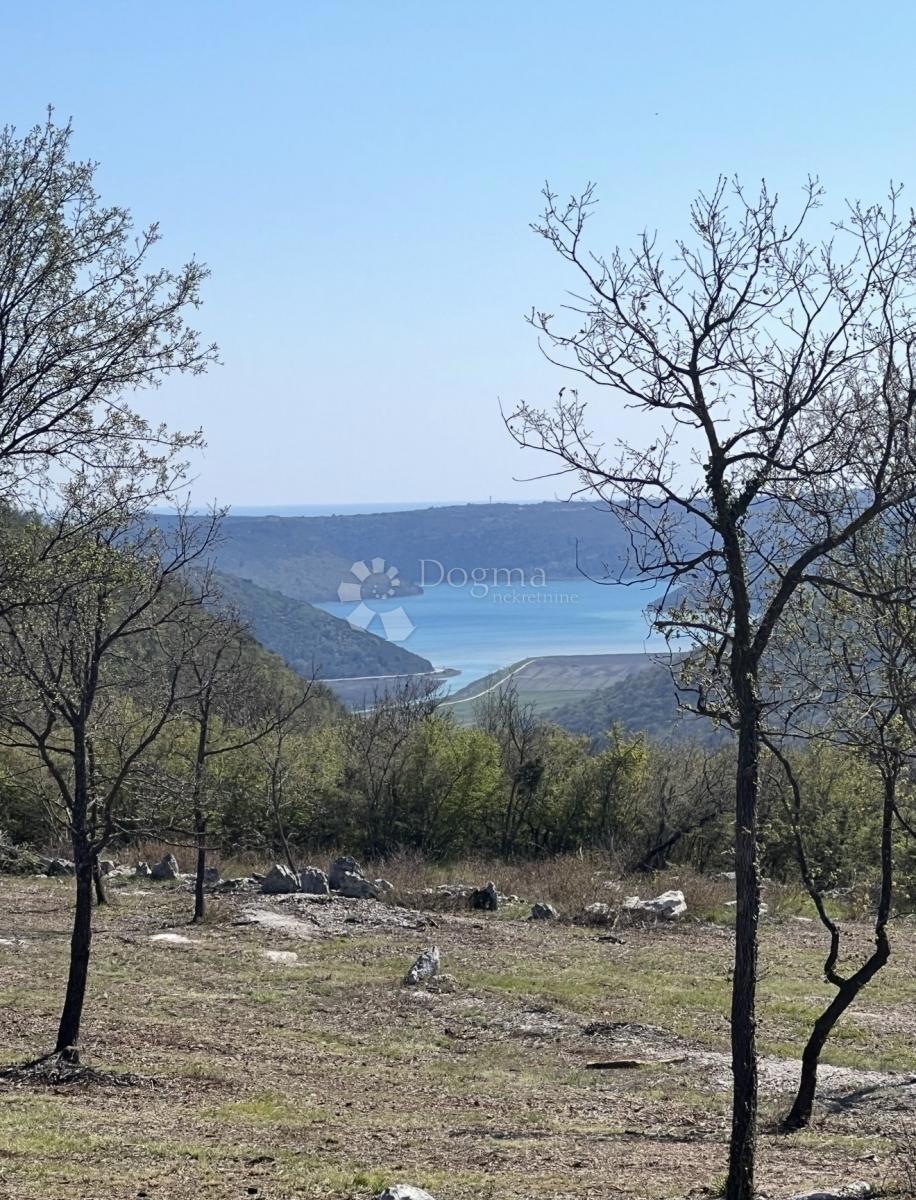 Zazidljivo zemljišče Kunj, Raša, 1.909m2