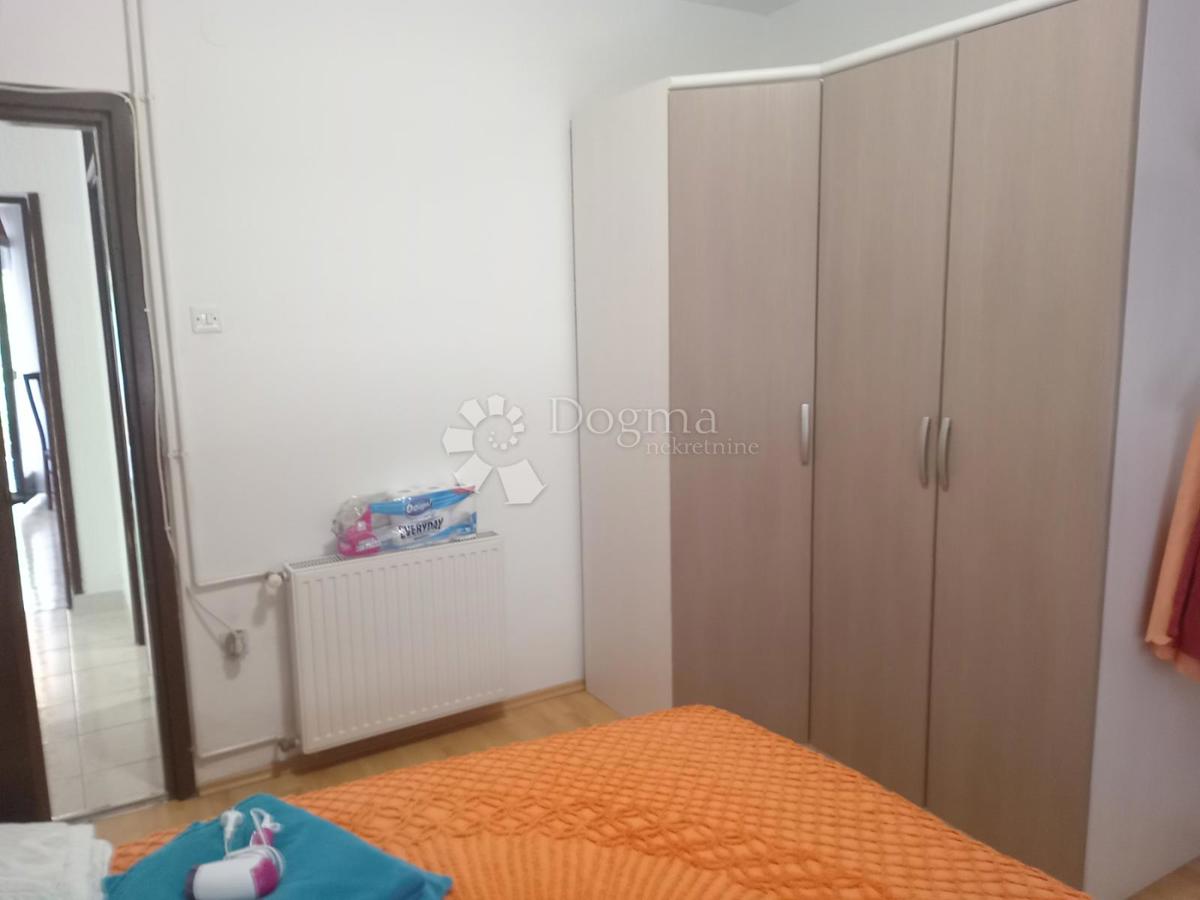 Priložnost! Stanovanje z vrtom in parkiriščem