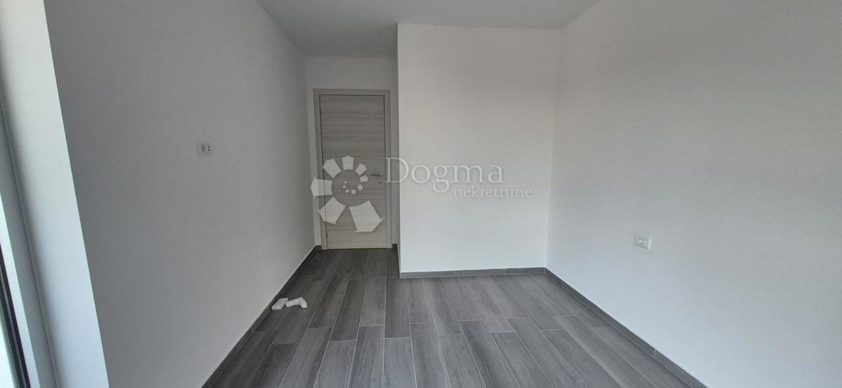 Dvosobno stanovanje v novogradnji 1 km od morja, površina 54,47 m2