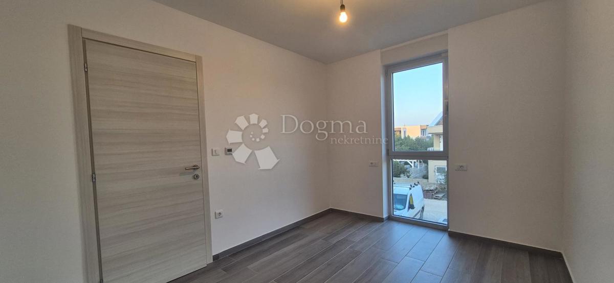 Dvosobno stanovanje v novogradnji 1 km od morja, površina 54,47 m2