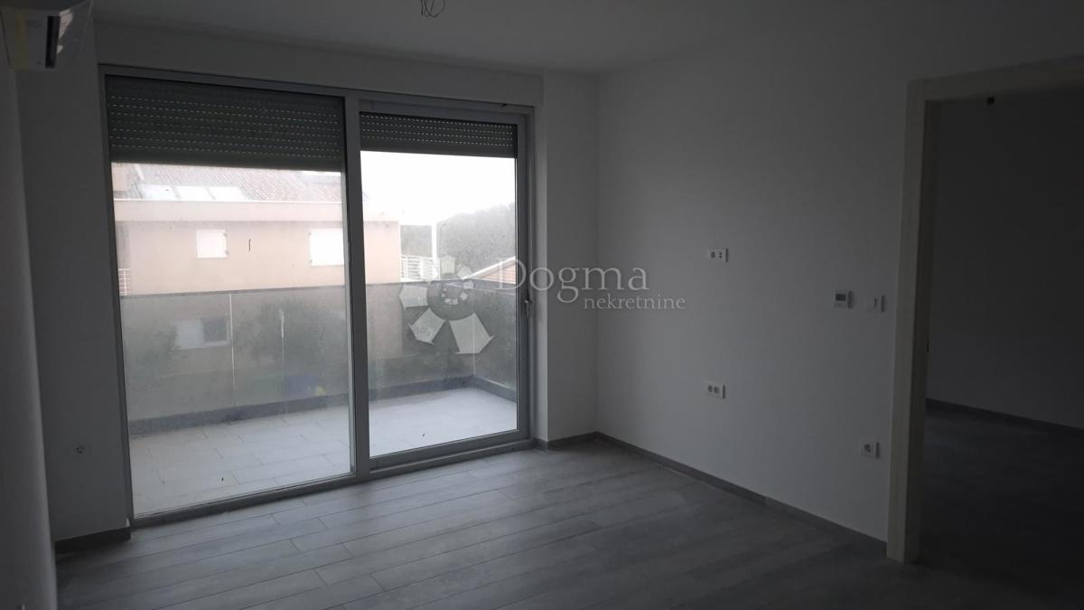 Dvosobno stanovanje v novogradnji 1 km od morja, površina 54,47 m2