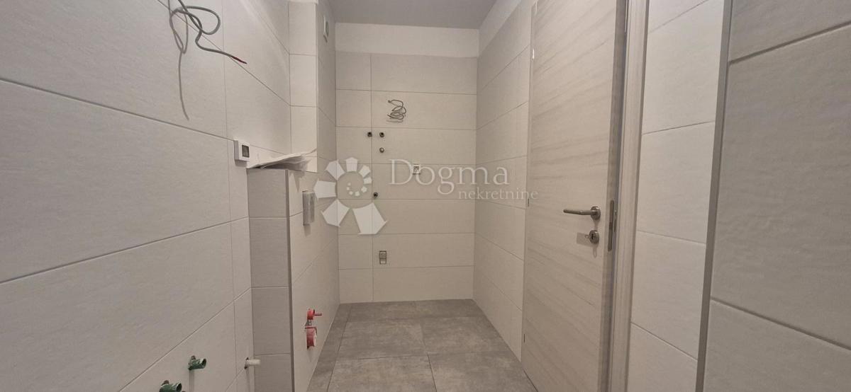 Dvosobno stanovanje v novogradnji 1 km od morja, površina 54,47 m2