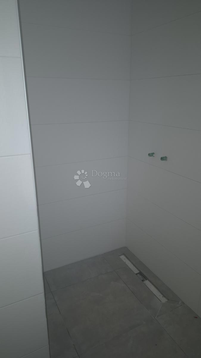 Dvosobno stanovanje v novogradnji 1 km od morja, površina 54,47 m2