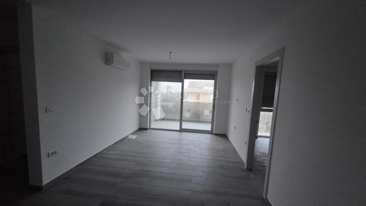 Dvosobno stanovanje v novogradnji 1 km od morja, površina 54,47 m2