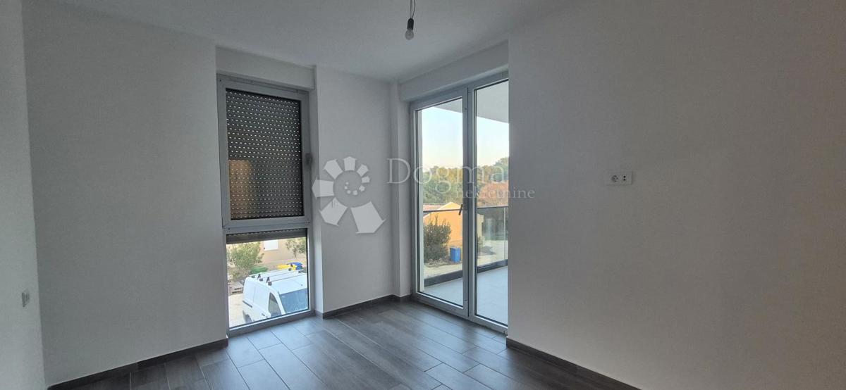 Dvosobno stanovanje v novogradnji 1 km od morja, površina 54,47 m2