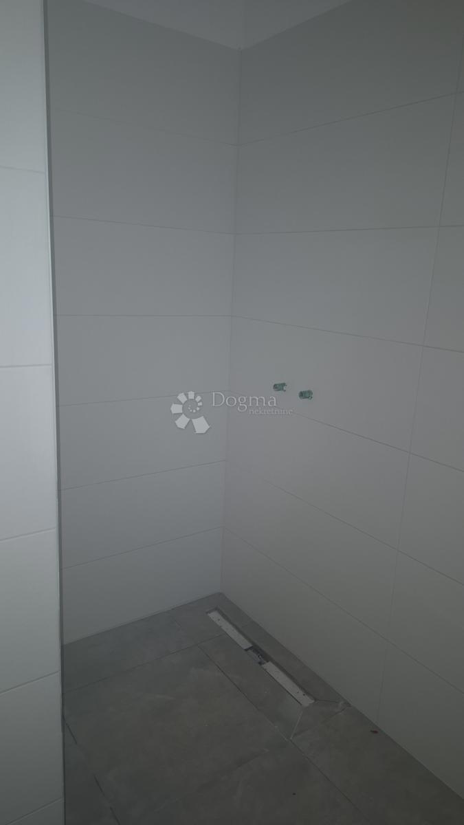 Dvosobno stanovanje v novogradnji 1 km od morja, površina 54,47 m2