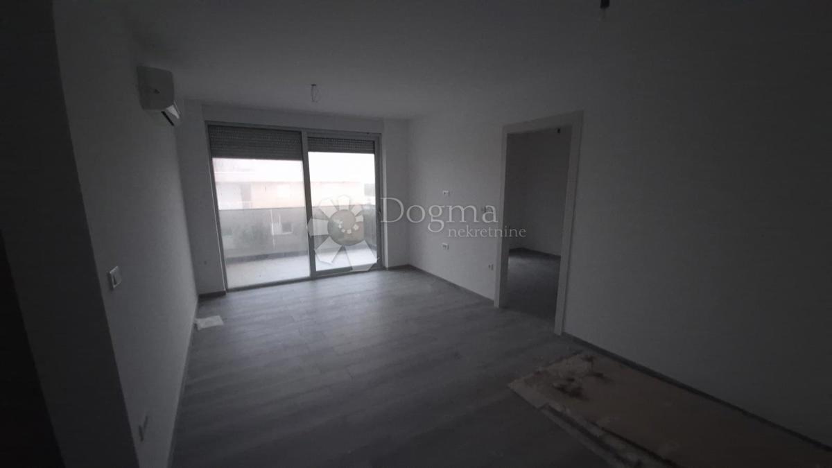 Dvosobno stanovanje v novogradnji 1 km od morja, površina 54,47 m2