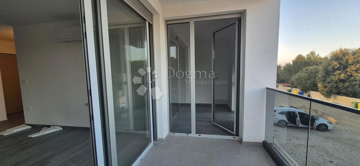 Dvosobno stanovanje v novogradnji 1 km od morja, površina 54,47 m2