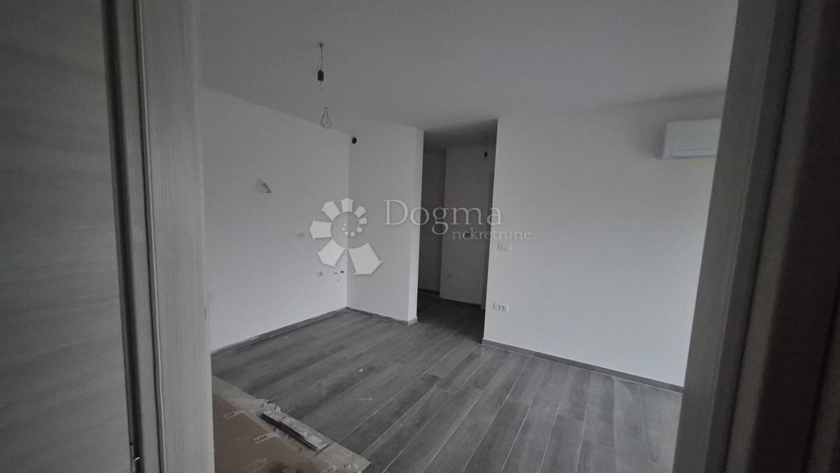 Dvosobno stanovanje v novogradnji 1 km od morja, površina 54,47 m2