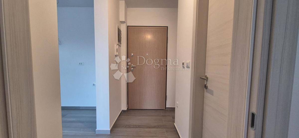 Dvosobno stanovanje v novogradnji 1 km od morja, površina 54,47 m2