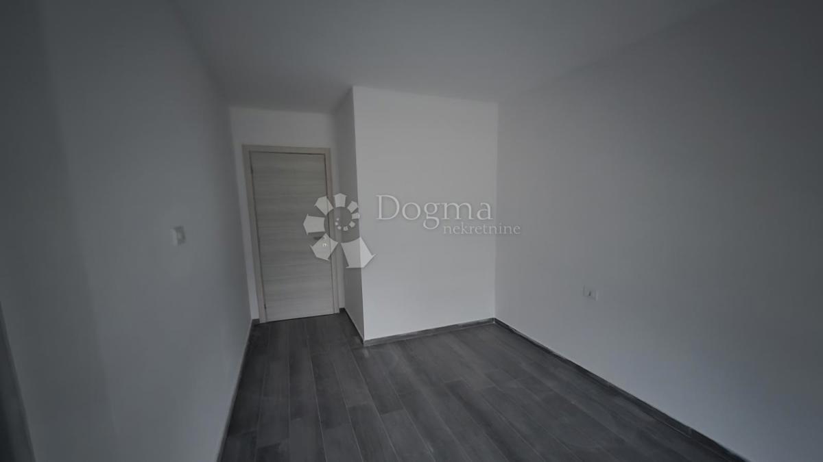 Dvosobno stanovanje v novogradnji 1 km od morja, površina 54,47 m2