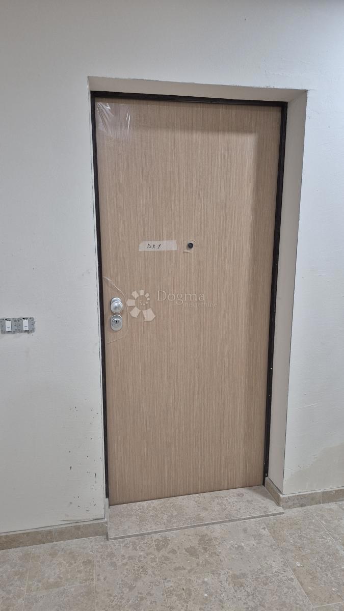 Dvosobno stanovanje v novogradnji 1 km od morja, površina 54,47 m2