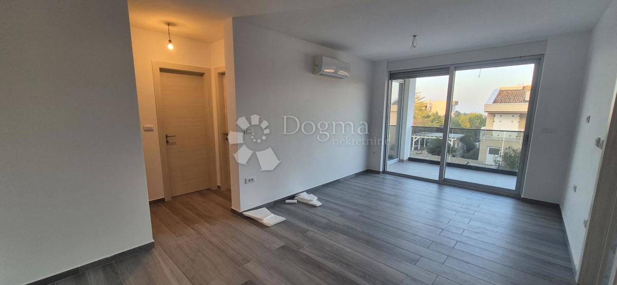 Dvosobno stanovanje v novogradnji 1 km od morja, površina 54,47 m2