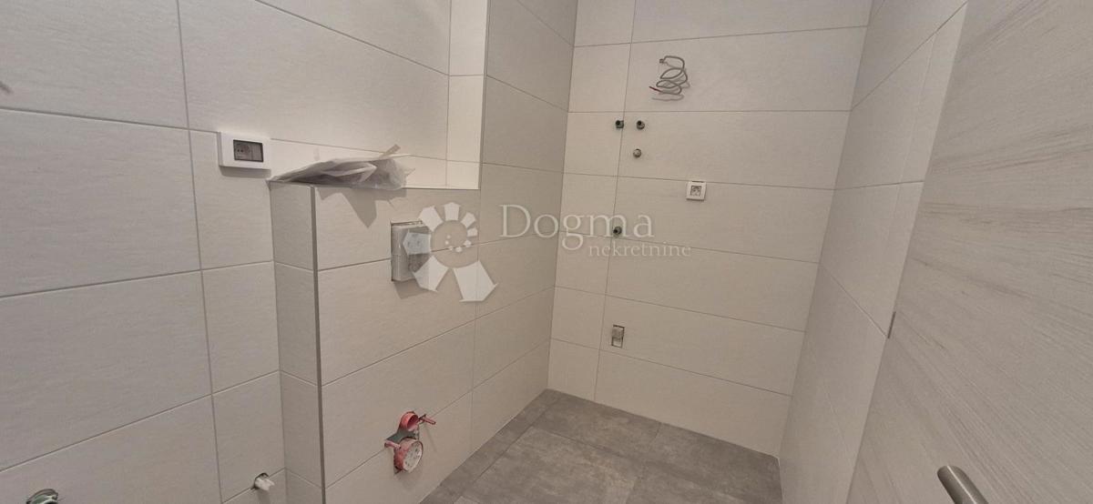 Dvosobno stanovanje v novogradnji 1 km od morja, površina 54,47 m2