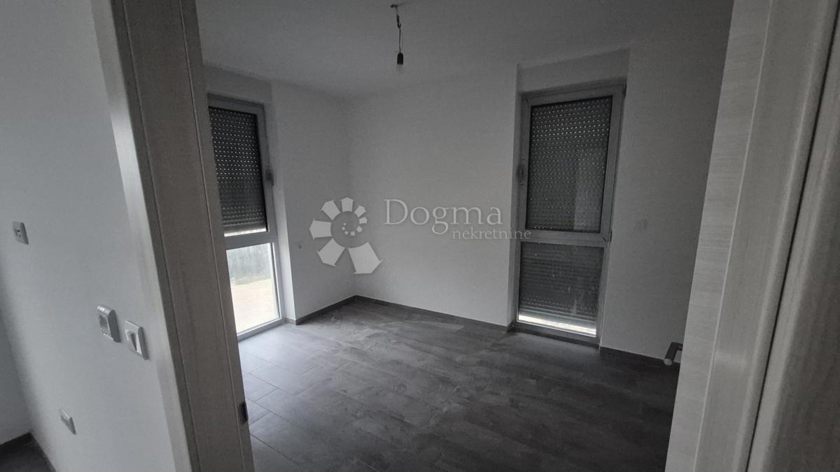 Dvosobno stanovanje v novogradnji 1 km od morja, površina 54,47 m2