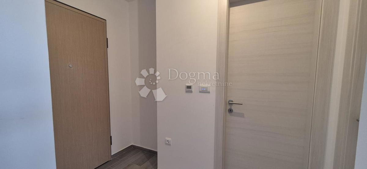 Dvosobno stanovanje v novogradnji 1 km od morja, površina 54,47 m2