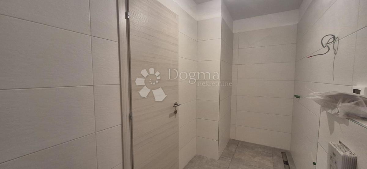 Dvosobno stanovanje v novogradnji 1 km od morja, površina 54,47 m2