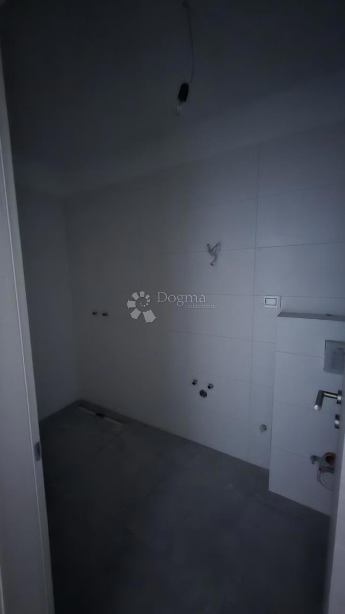 Dvosobno stanovanje v novogradnji 1 km od morja, površina 54,47 m2