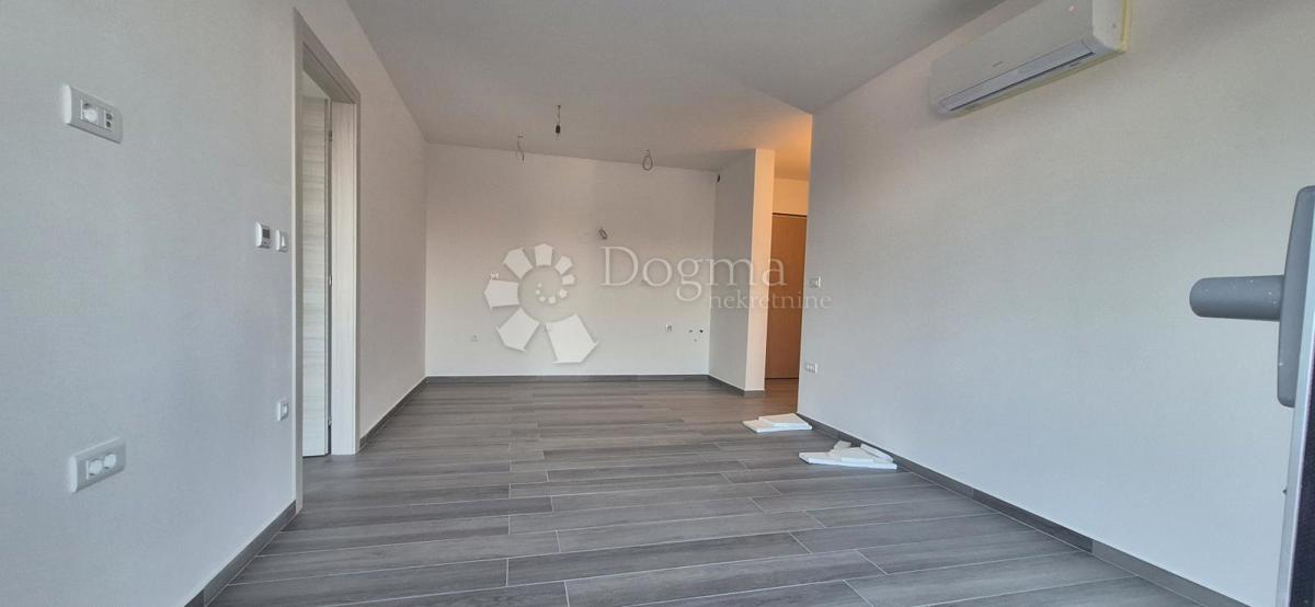 Dvosobno stanovanje v novogradnji 1 km od morja, površina 54,47 m2