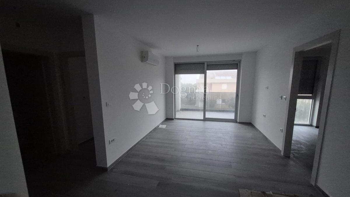 Dvosobno stanovanje v novogradnji 1 km od morja, površina 54,47 m2