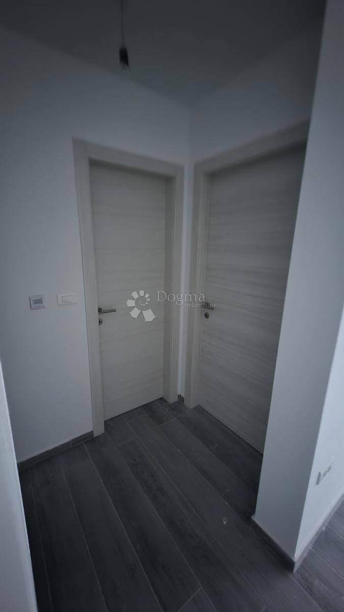 Dvosobno stanovanje v novogradnji 1 km od morja, površina 54,47 m2