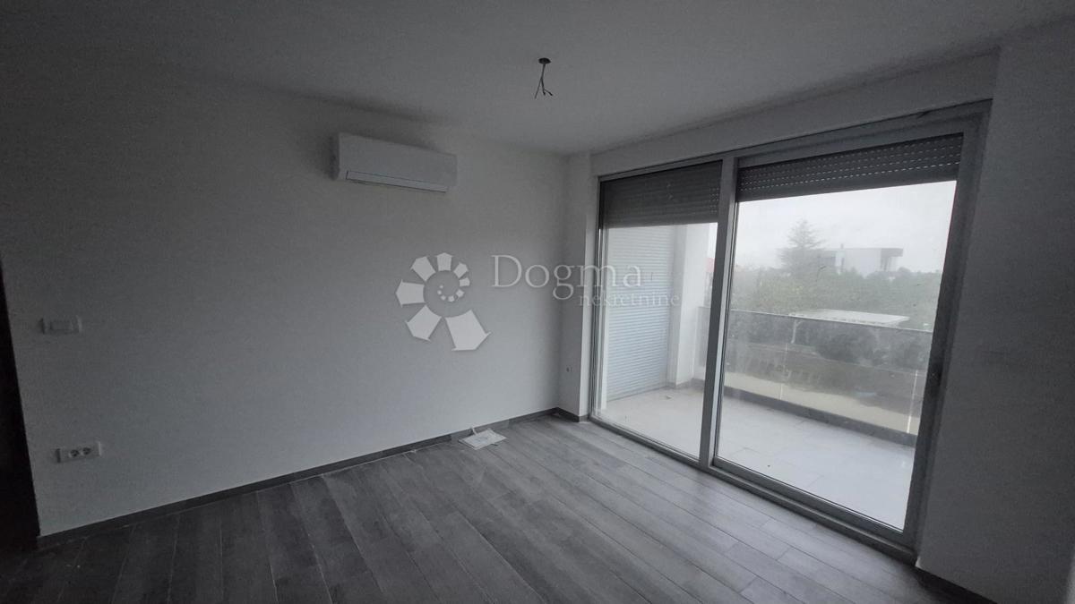 Dvosobno stanovanje v novogradnji 1 km od morja, površina 54,47 m2