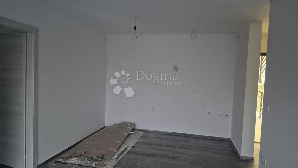 Dvosobno stanovanje v novogradnji 1 km od morja, površina 54,47 m2