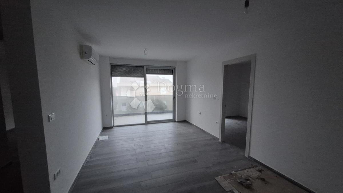 Dvosobno stanovanje v novogradnji 1 km od morja, površina 54,47 m2