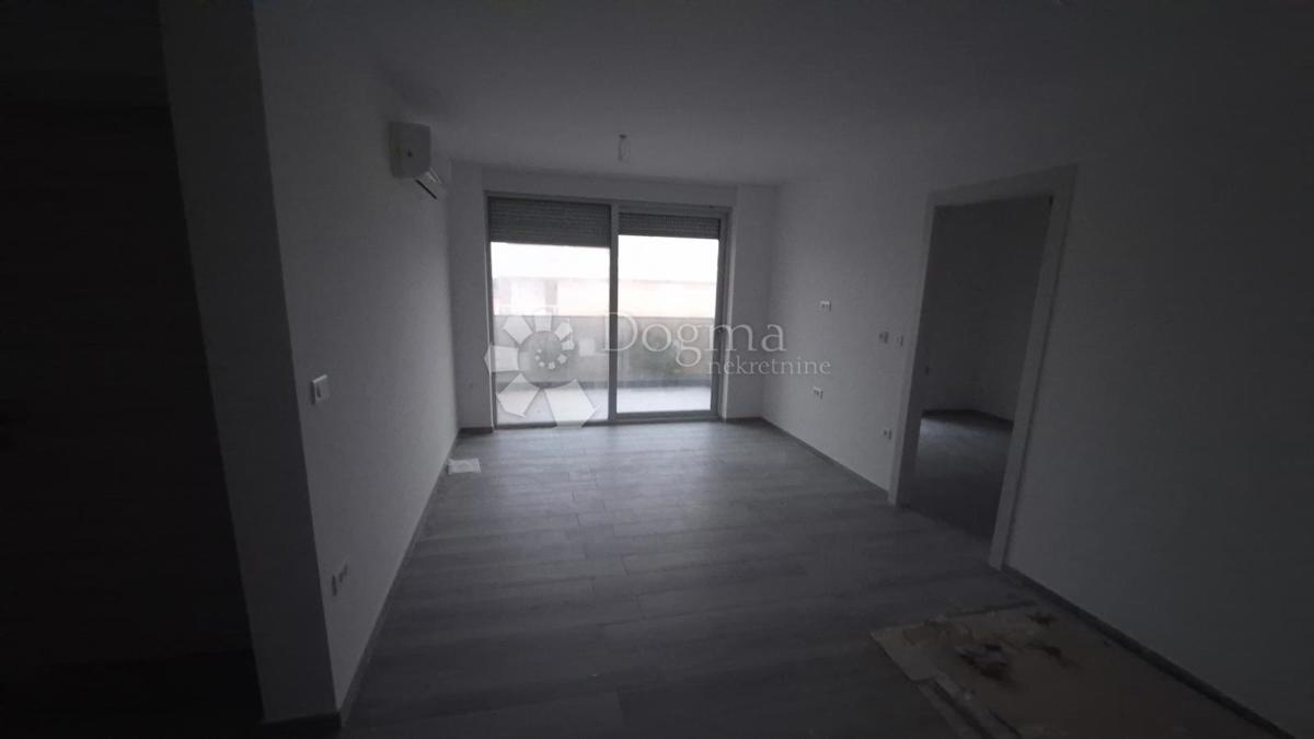 Dvosobno stanovanje v novogradnji 1 km od morja, površina 54,47 m2