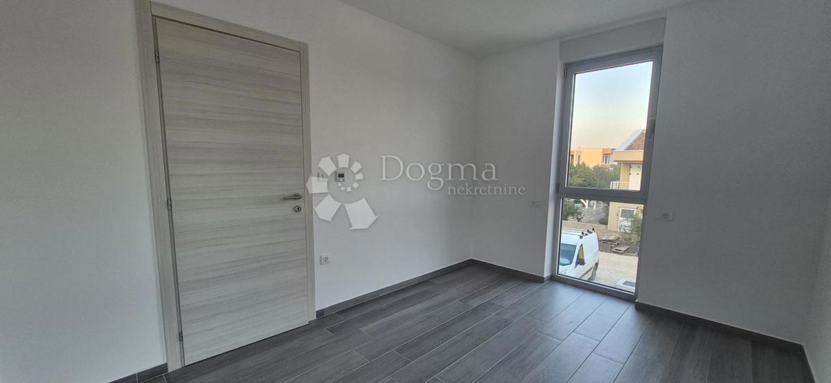 Dvosobno stanovanje v novogradnji 1 km od morja, površina 54,47 m2