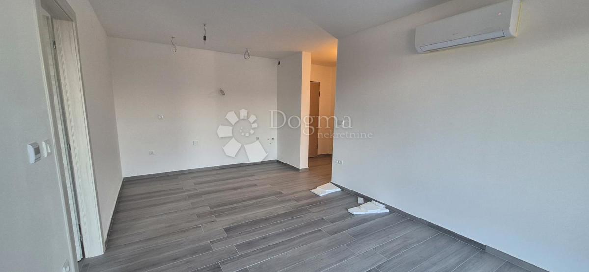 Dvosobno stanovanje v novogradnji 1 km od morja, površina 54,47 m2