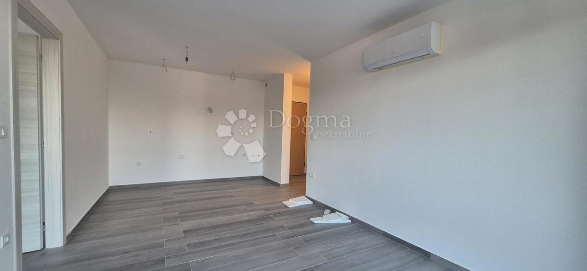 Dvosobno stanovanje v novogradnji 1 km od morja, površina 54,47 m2