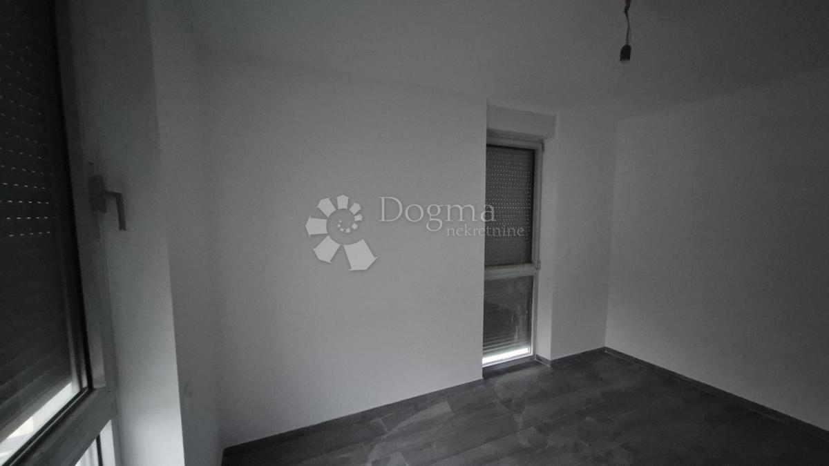 Dvosobno stanovanje v novogradnji 1 km od morja, površina 54,47 m2