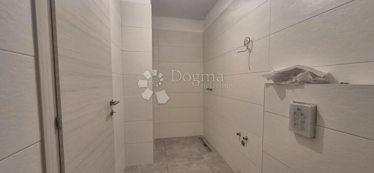 Dvosobno stanovanje v novogradnji 1 km od morja, površina 54,47 m2