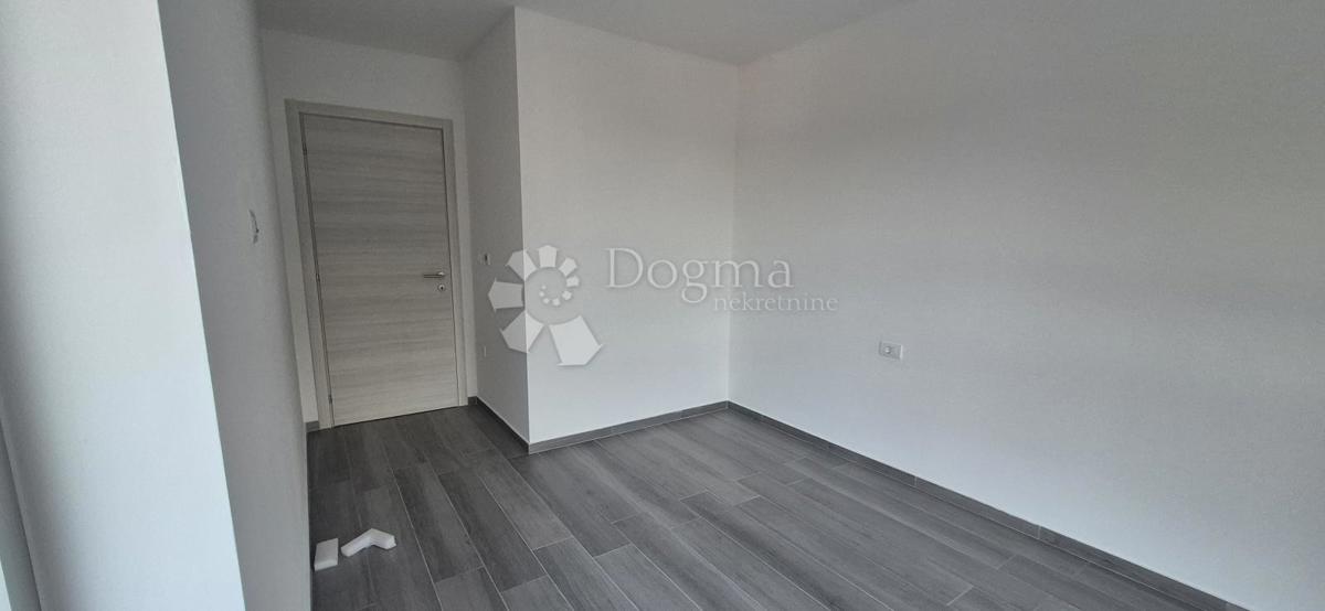 Dvosobno stanovanje v novogradnji 1 km od morja, površina 54,47 m2